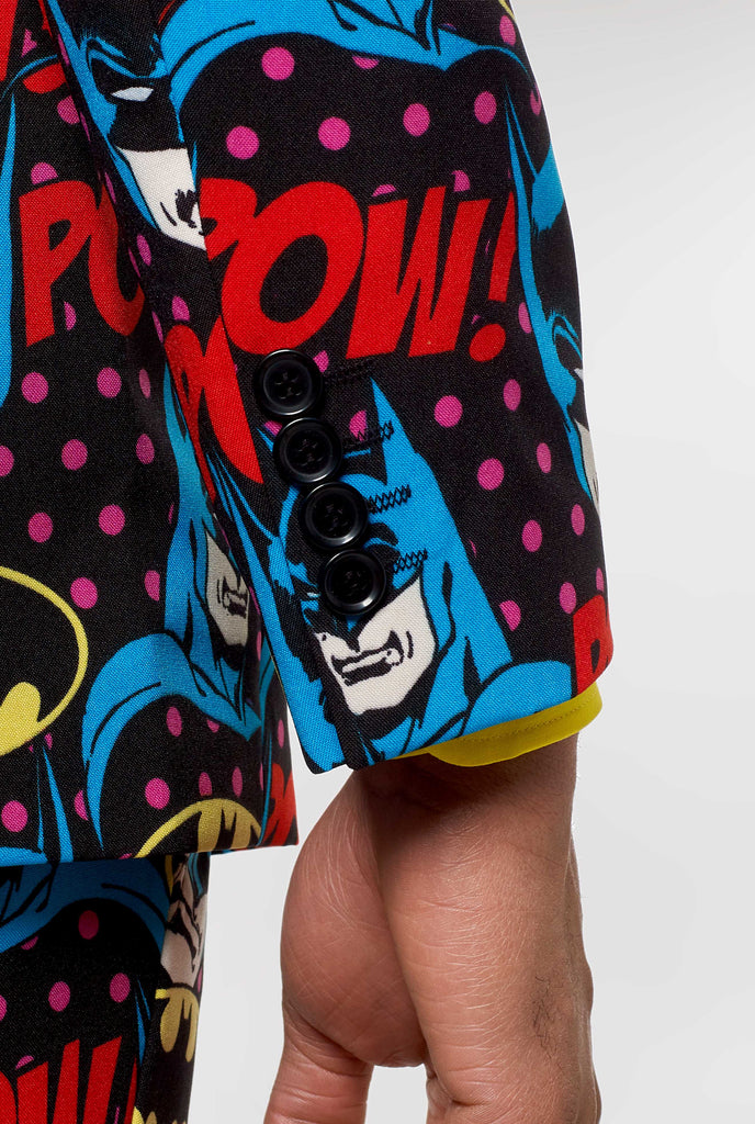 Batman themed men's suit with comic book icons worn by man