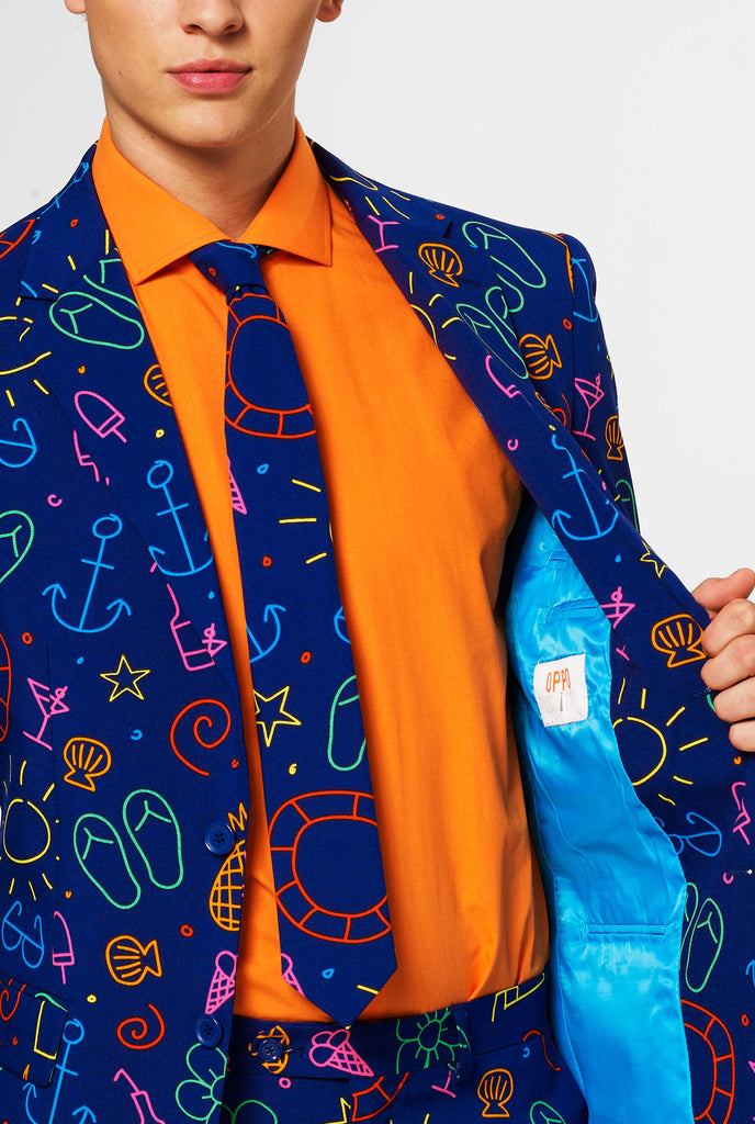 Dark blue suit with bright doodle iconography by man shown inside of jacket