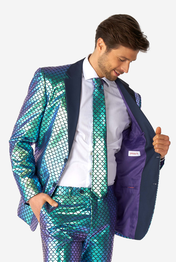 Man wearing blue fish scale motive suit