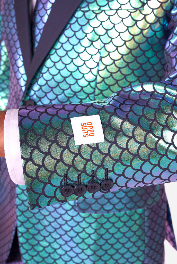 Man wearing blue fish scale motive suit, sleeve close up