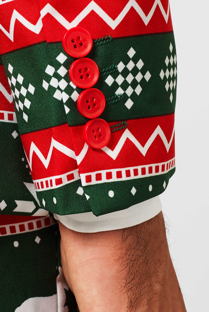 Green and red Christmas themed men's suit worn by man close up view