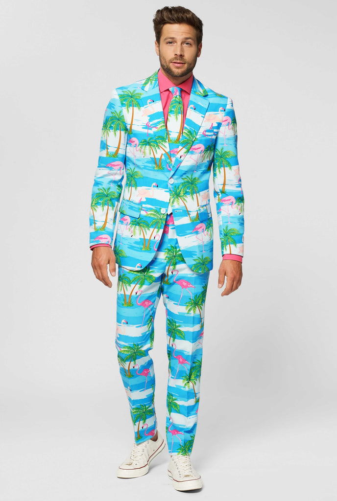 Blue and white men's suit with tropical flamingo print Flaminguy worn by man