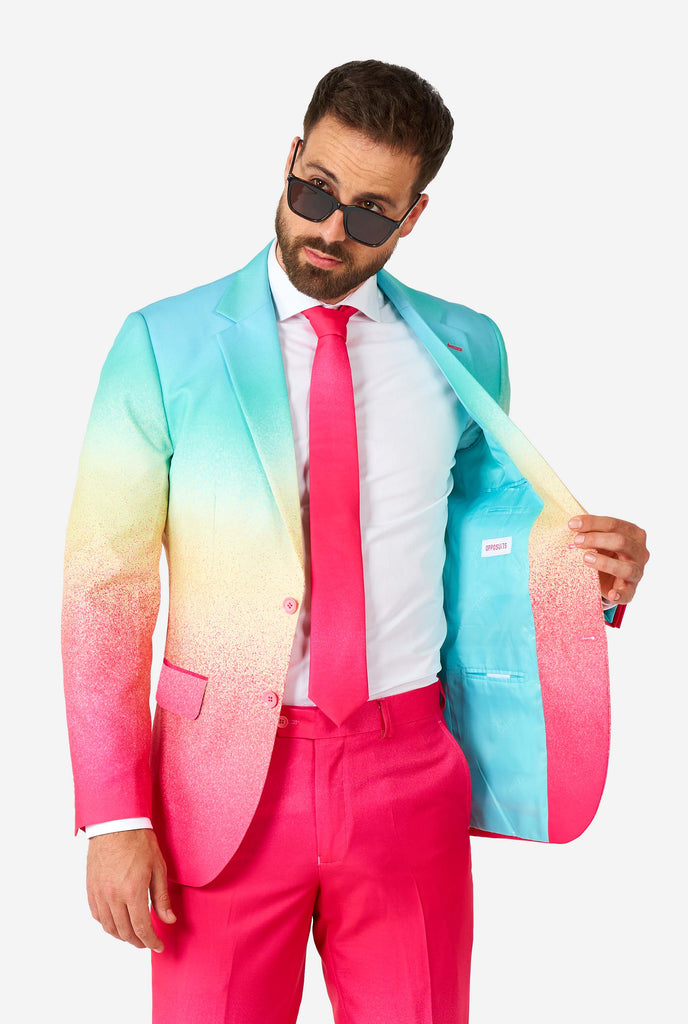 Man wearing rainbow colored suit, view jacket inside