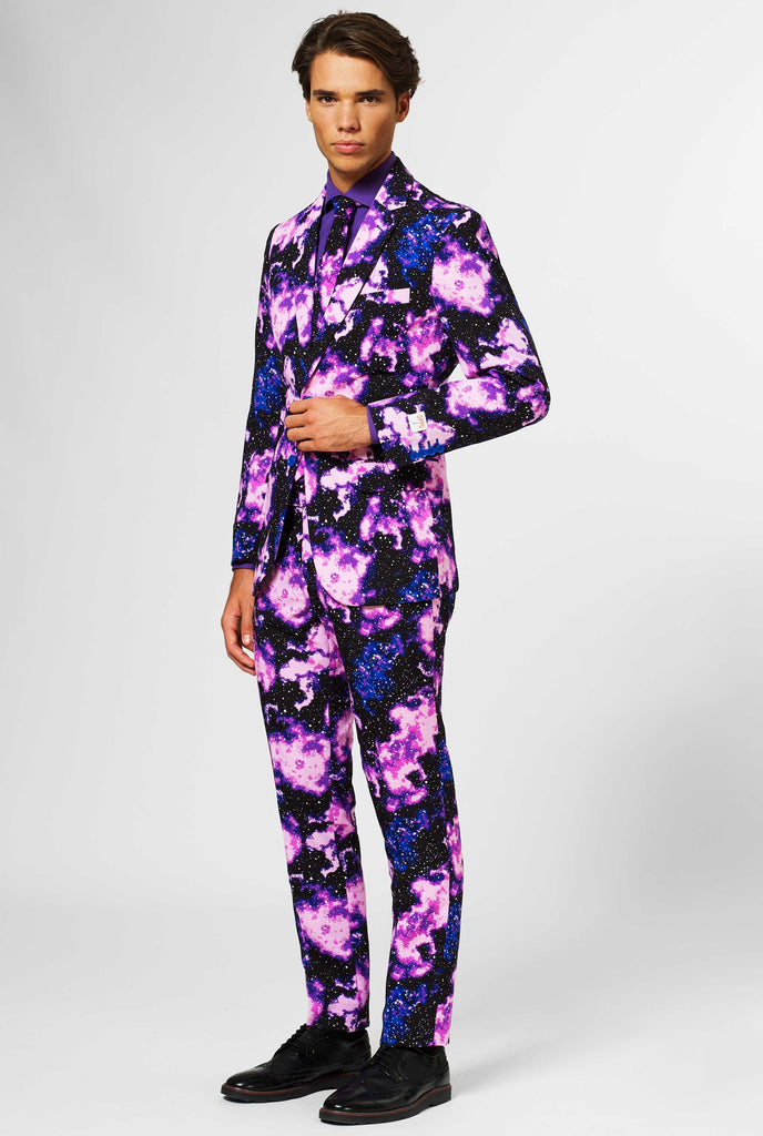 Man wearing suit with galaxy milkyway print