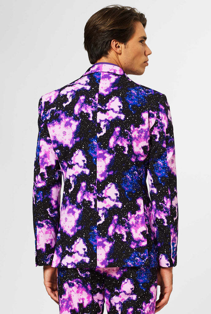 Man wearing suit with galaxy milkyway print