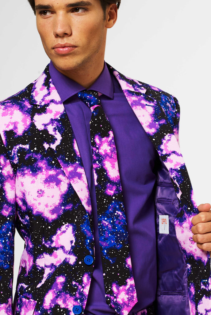 Man wearing suit with galaxy milkyway print, close up