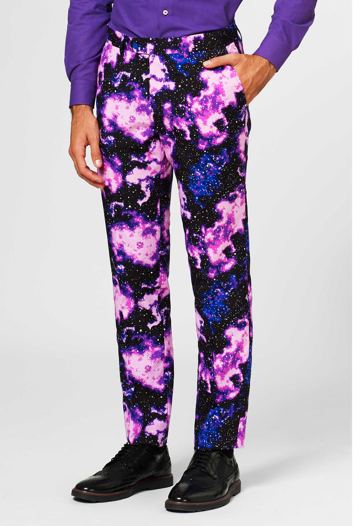 Man wearing suit with galaxy milkyway print, pants close up