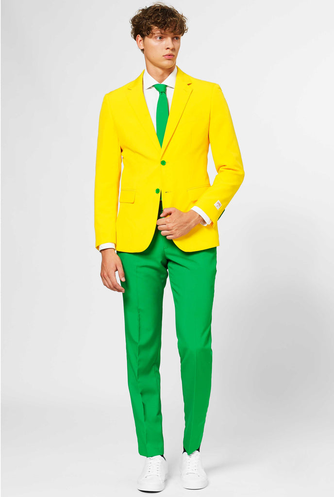 Man wearing green and yellow suit