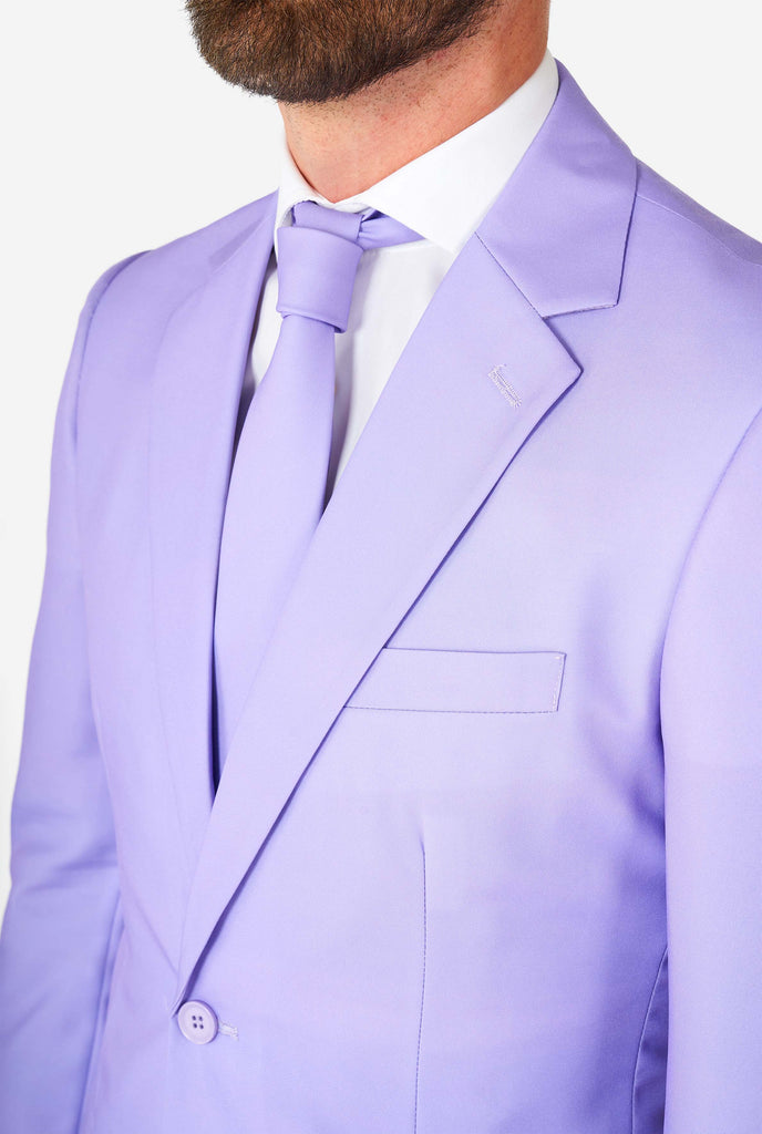 Man wearing lavender purple colored suit