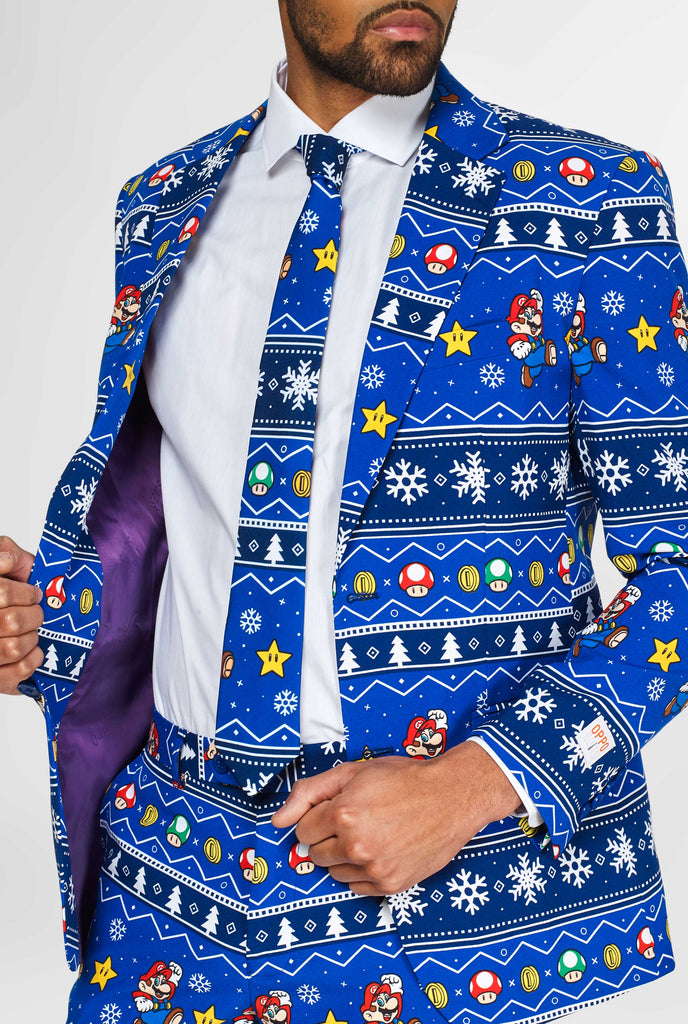 Super Mario suit with Christmas themes worn by man showing inner lining