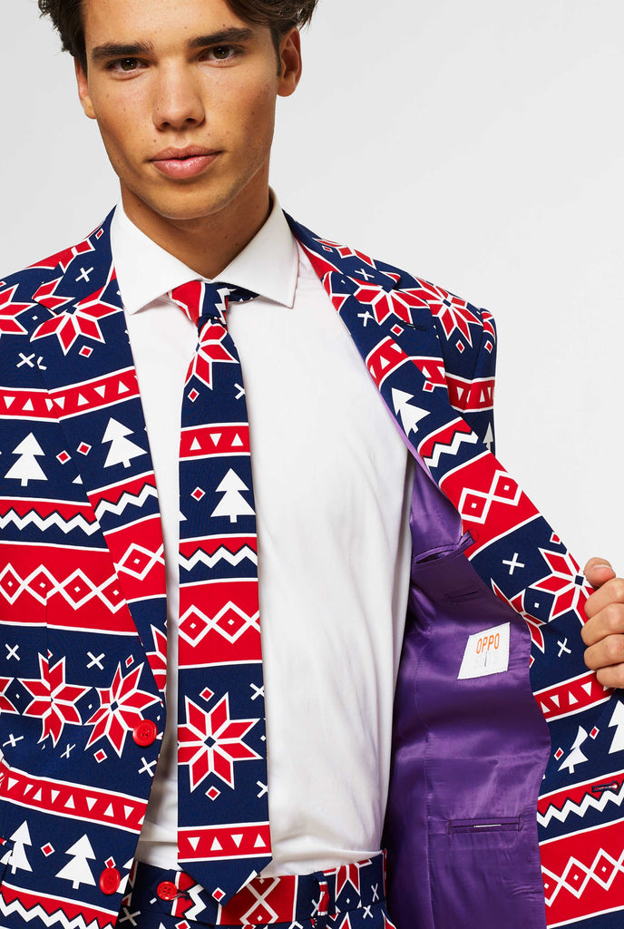 Nordic themed Christmas suit worn by man shown inside of jacket