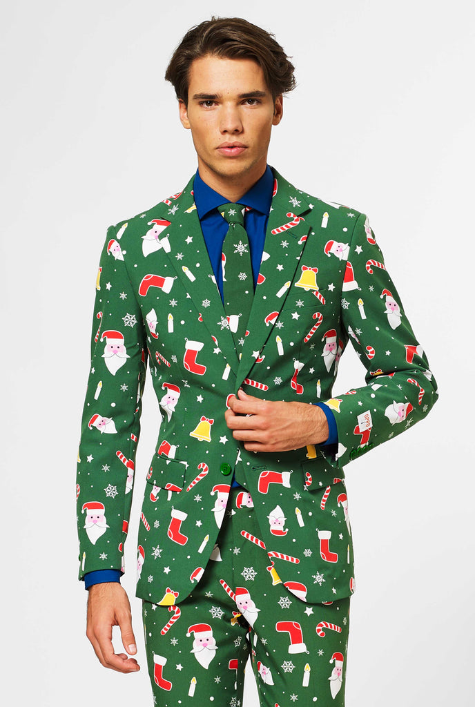 Man wearing green Christmas suit and blue dress shirt