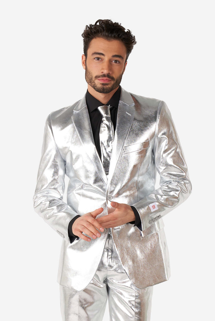 Man wearing shiny silver suit 