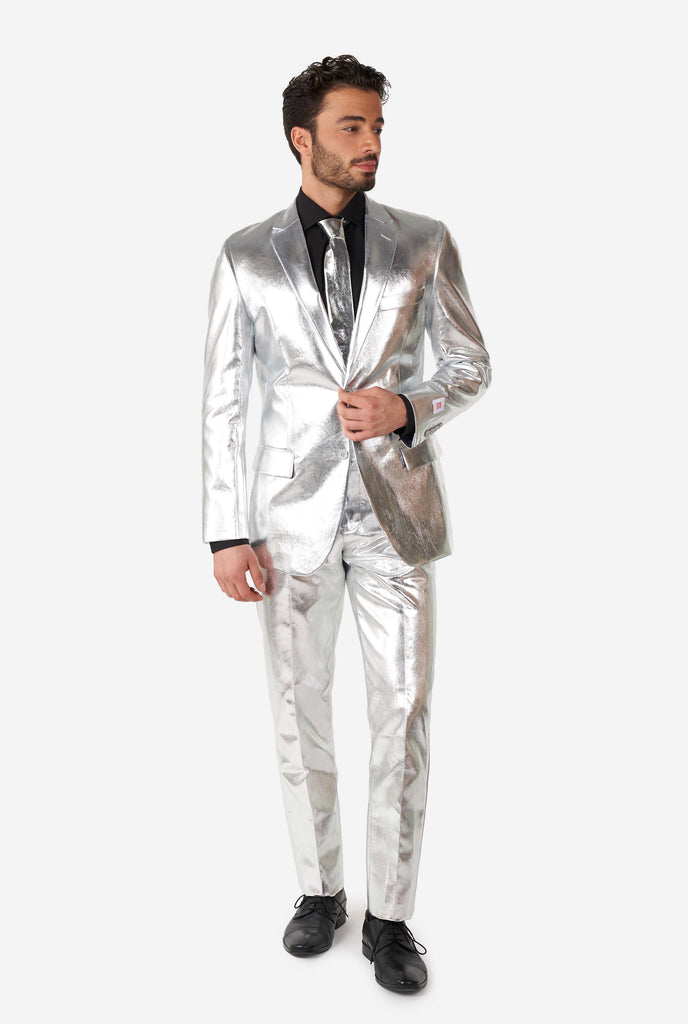 Man wearing shiny silver suit 