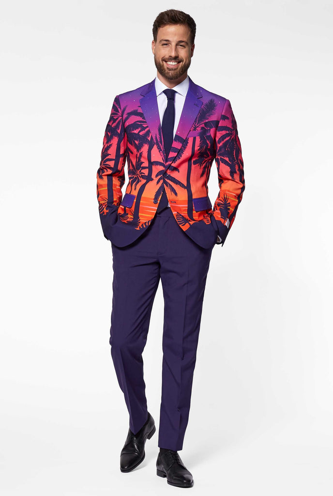 Man wearing Suave Sunset Hawaiian men's suit