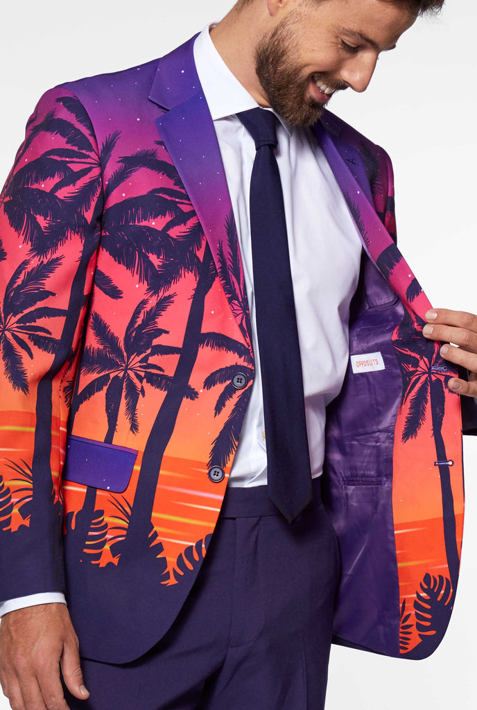 Man wearing Suave Sunset Hawaiian men's suit