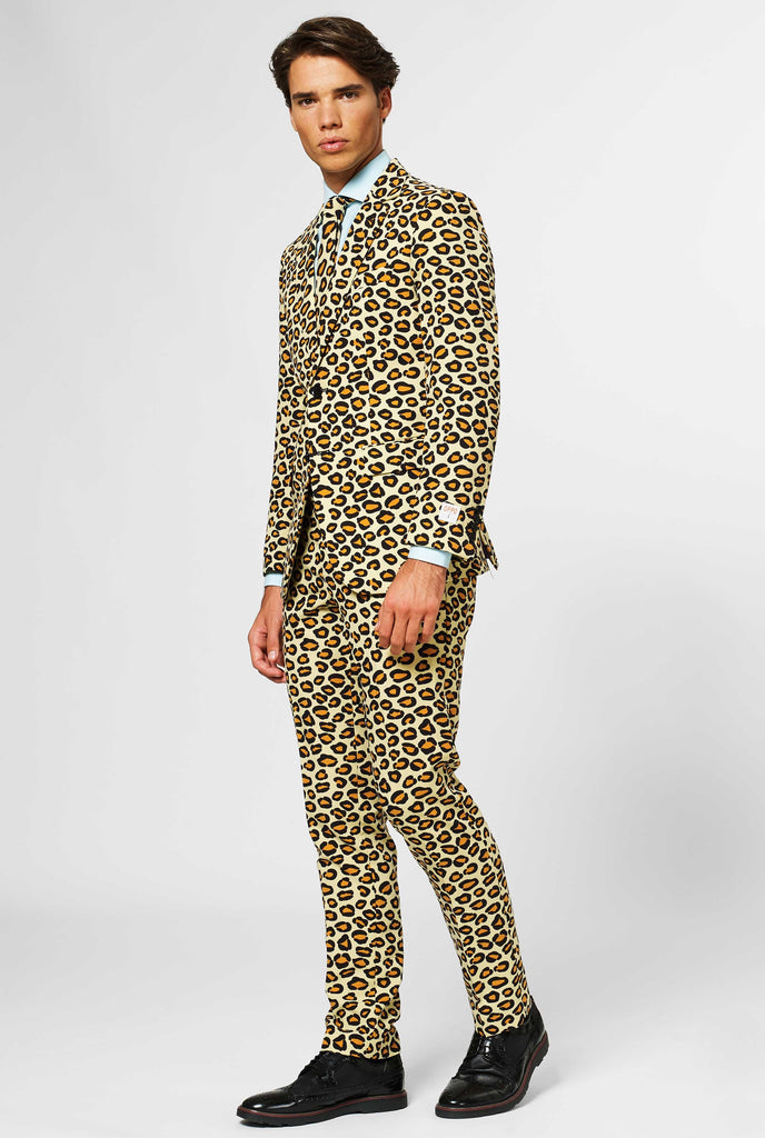 Man wearing men's suit with panther print