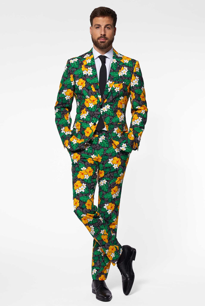 Man wearing men's suit with flower print