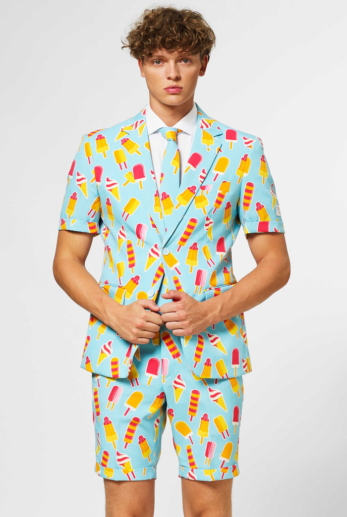 Man wearing light blue summer suit with popsicle print