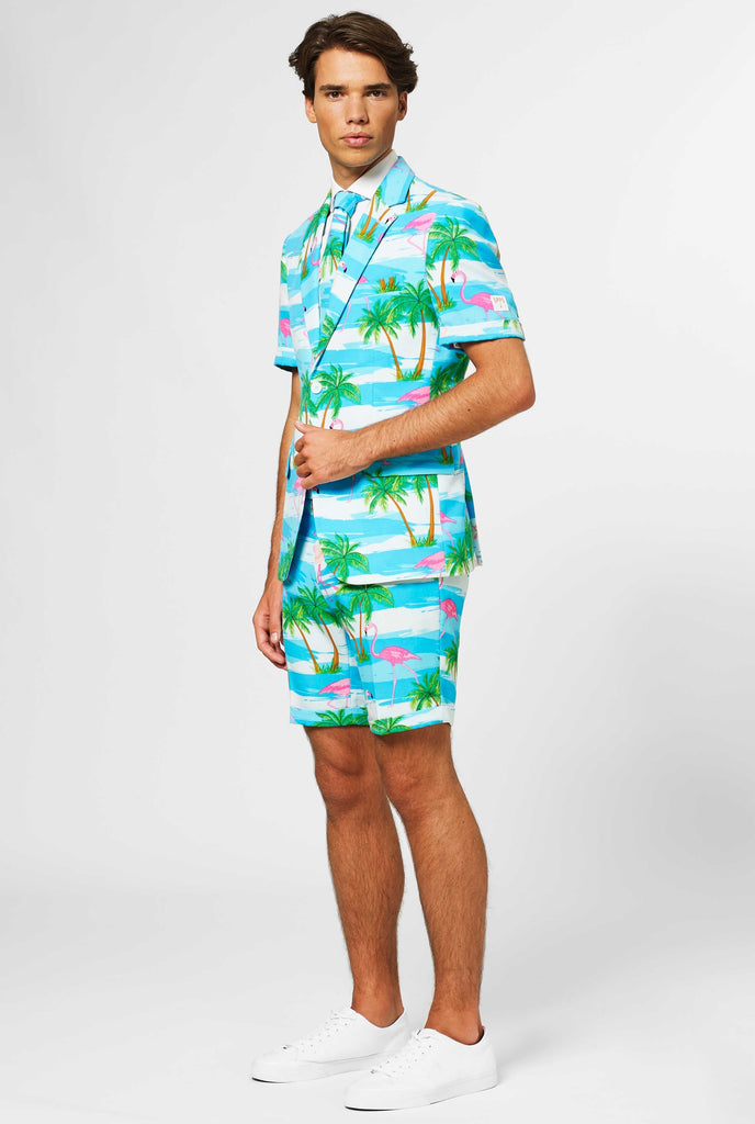 Man wearing summer suit with tropical flamingo print