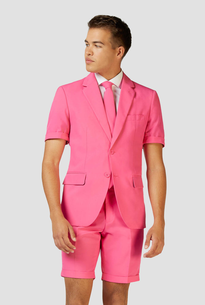 Man wearing pink summer suit