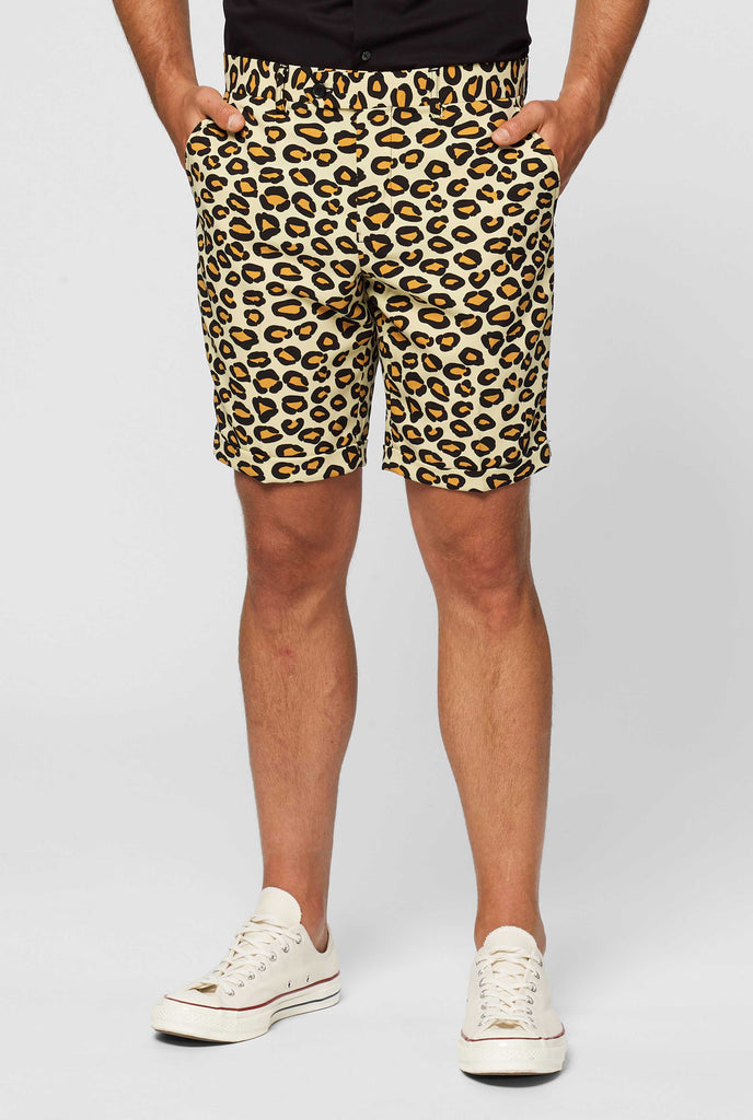 Man wearing summer suit with leopard print, close up of pants