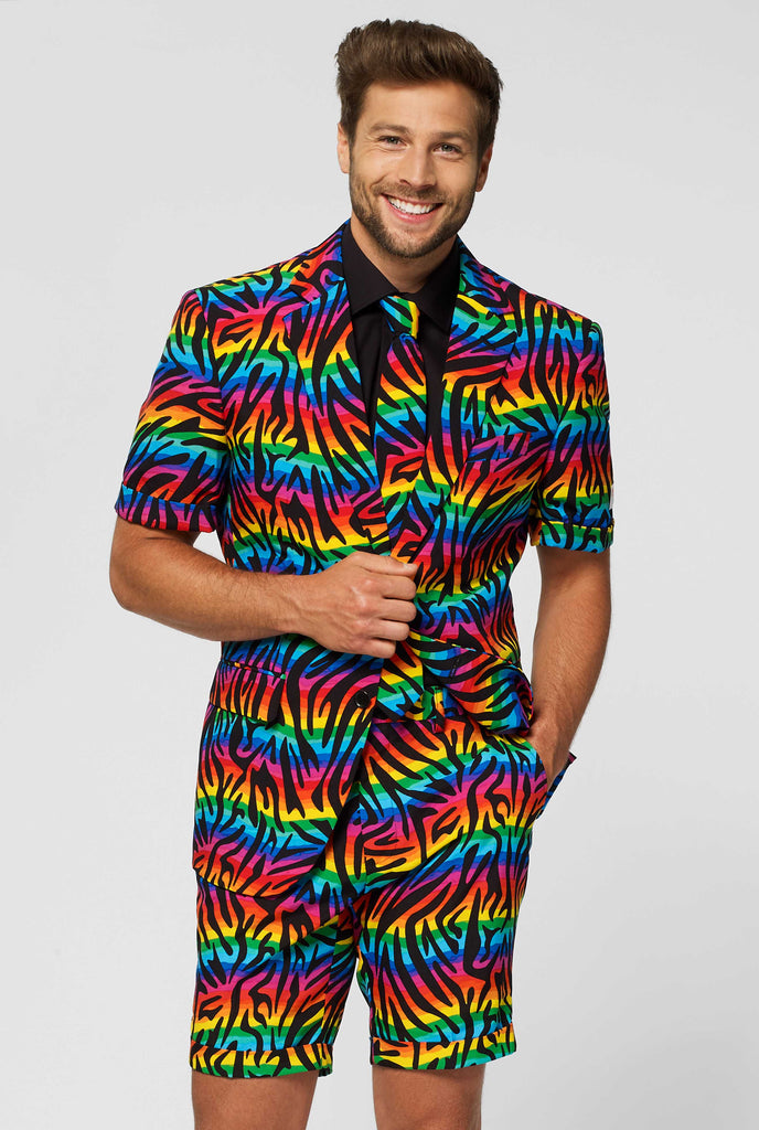 Man wearing summer suit with rainbow zebra stripes print