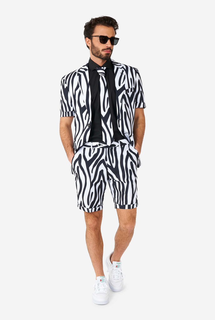 Man wearing summer suit with black and white zebra stripes