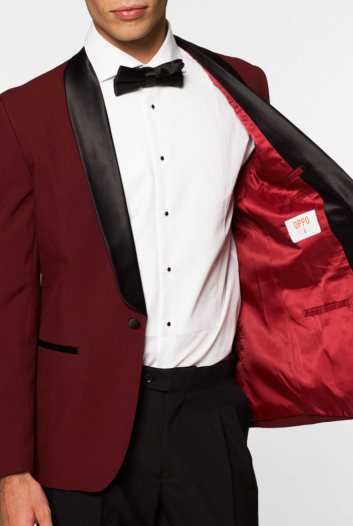 Burgundy red and black tuxedo Hot Burgundy worn by men inside jacket