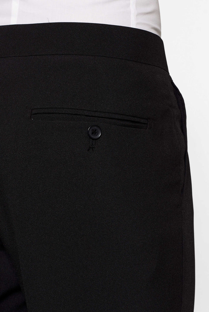 Blue and black tuxedo Midnight Blue worn by men backside pants pocket