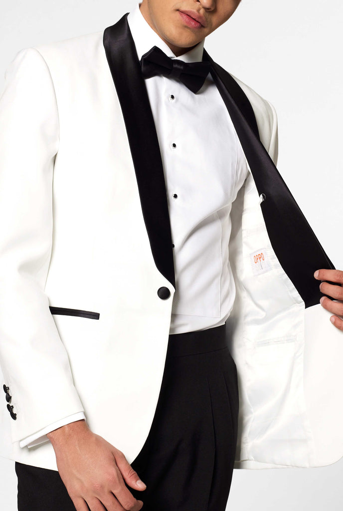 White with black tuxedo suit Pearly White worn by man close up inside blazer