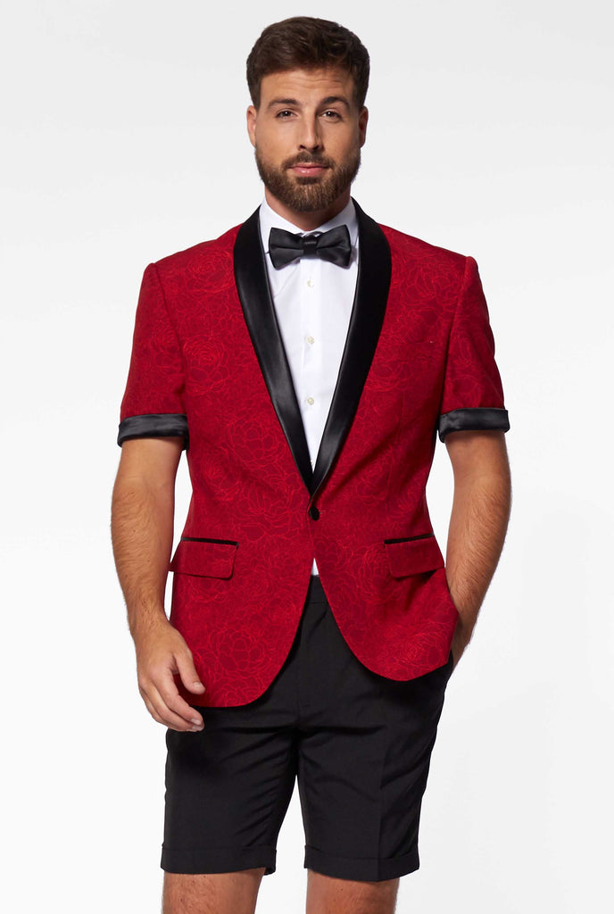 Man wearing red summer tuxedo with flower print