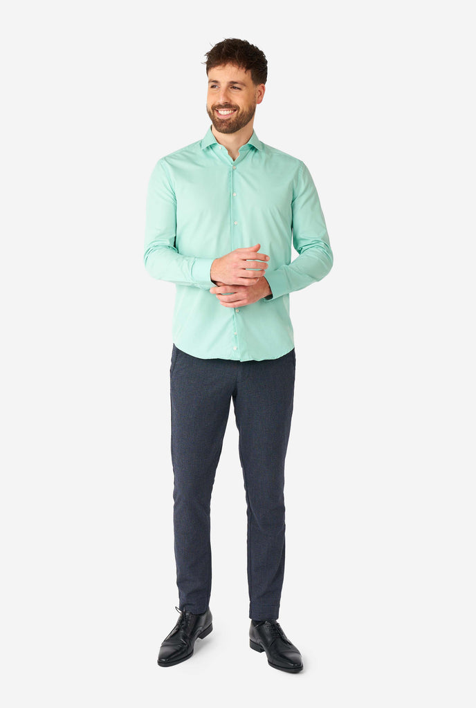 Man wearing mint green dress shirt