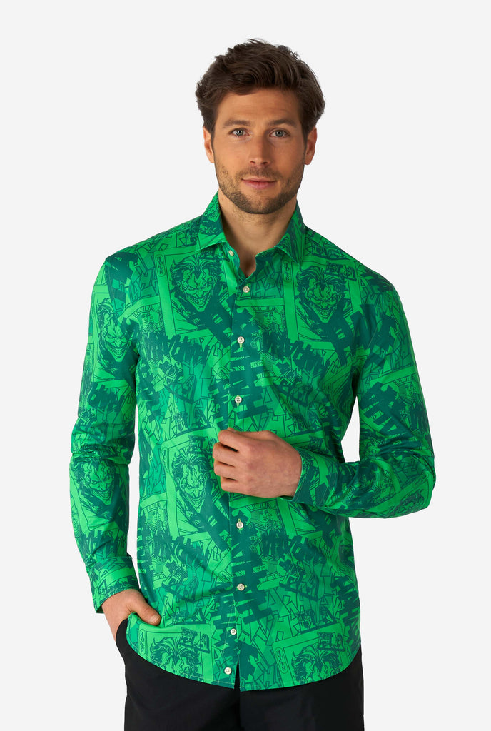 Man wearing green dress shirt with The Joker print