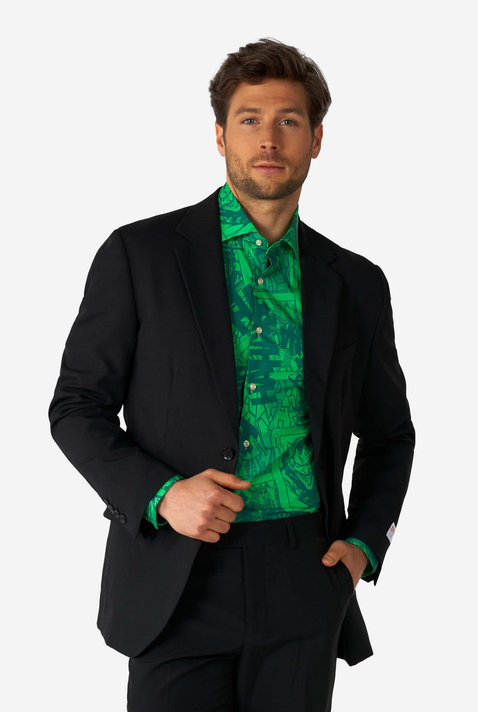 Man wearing green dress shirt with The Joker print