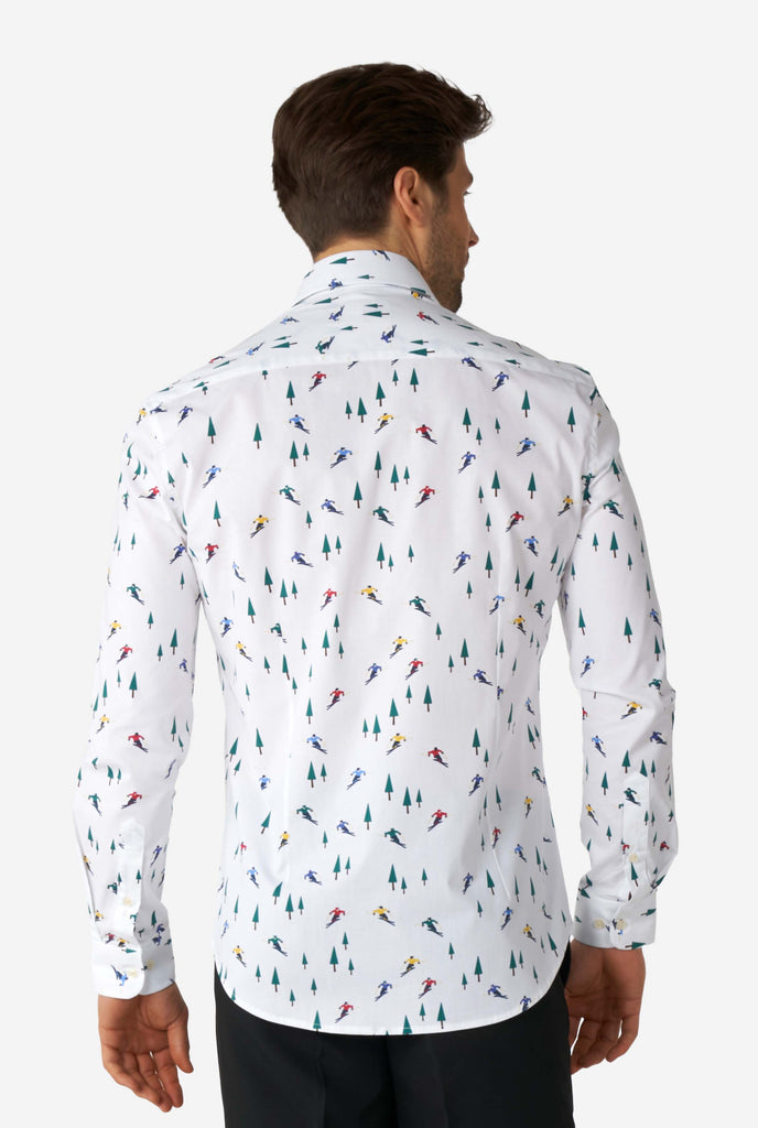 Man wearing white dress shirt with winter print, view from the back