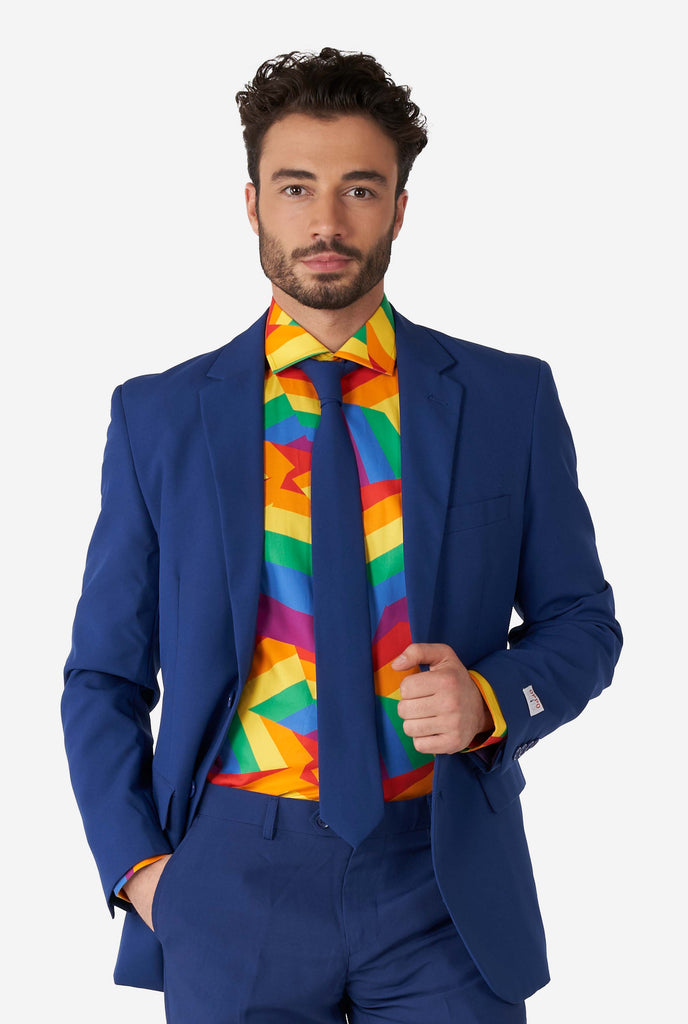 Man wearing colorful rainbow pride dress shirt and blue men's suit