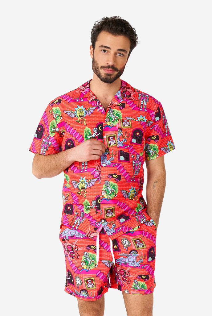 Man wearing summer outfit, consisting of short and shirt, with Rick and Morty print