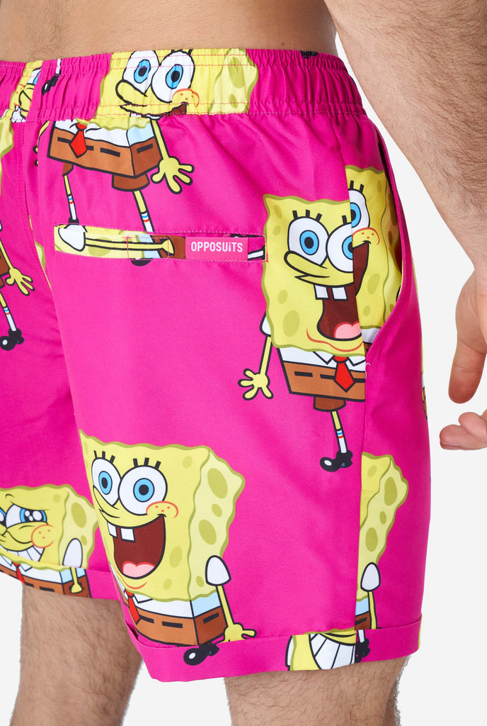 Man wearing summer outfit with SpongeBob SquarePants print, short close up