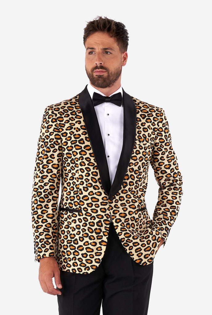 Man wearing tuxedo with jaguar print jacket