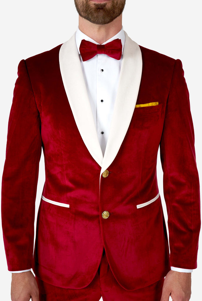 Man wearing red and white santa Christmas tuxedo