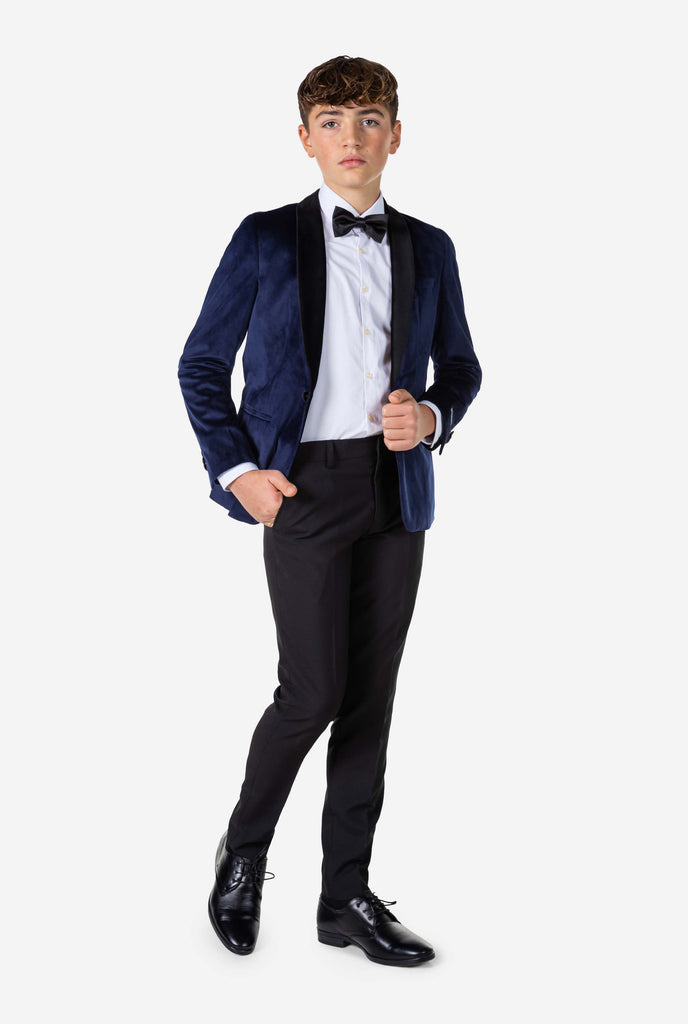 Teen wearing blue velvet Christmas Dinner Jacket