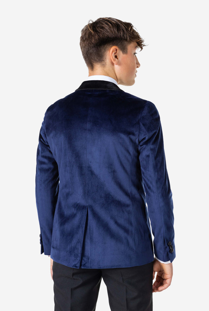 Teen wearing blue velvet Christmas Dinner Jacket, view from the back