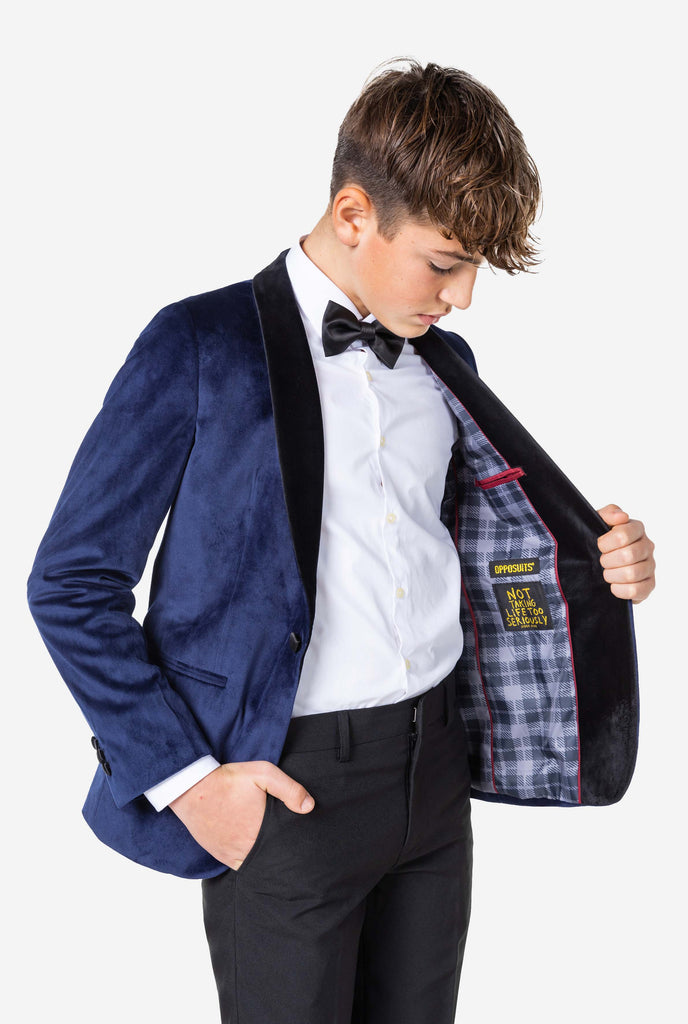 Teen wearing blue velvet Christmas Dinner Jacket