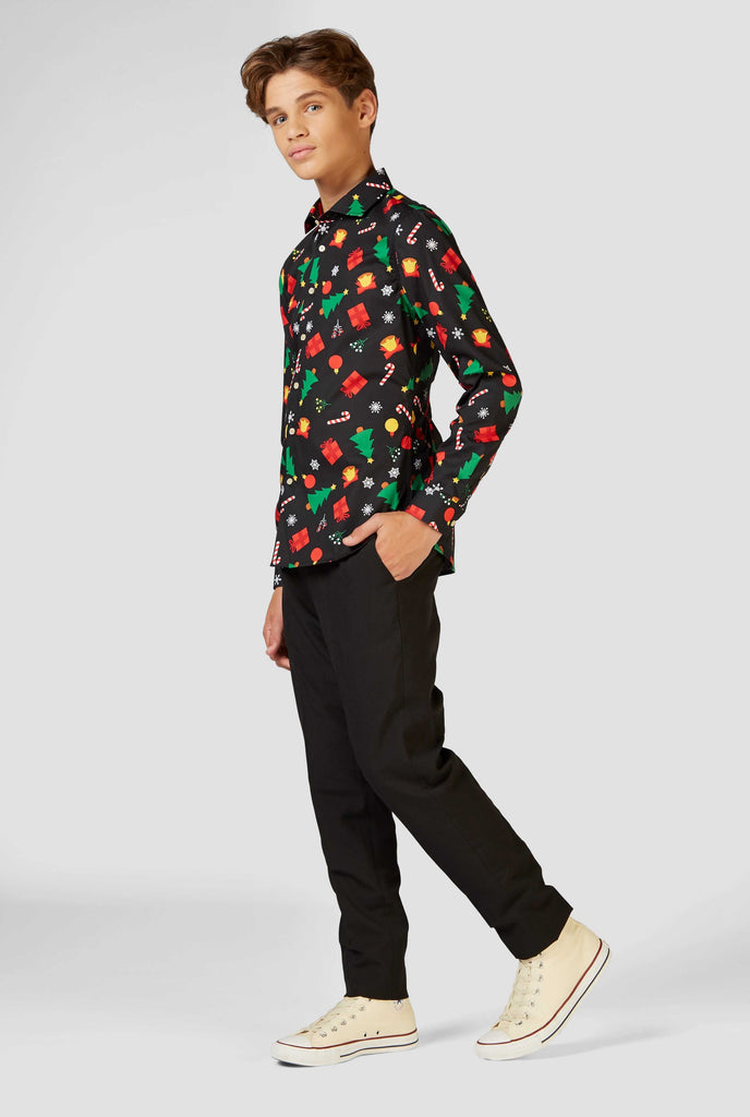 Funny black Christmas icons dress shirt worn by a teen boy 