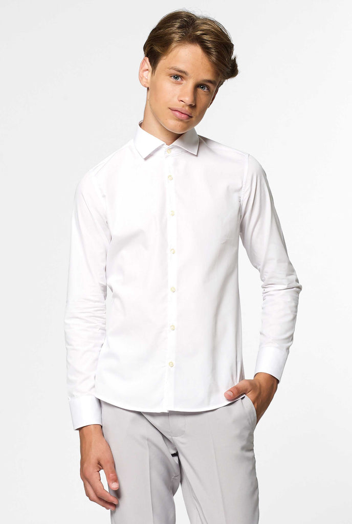 Long sleeve white shirt for boys worn by boy with hand in pocket