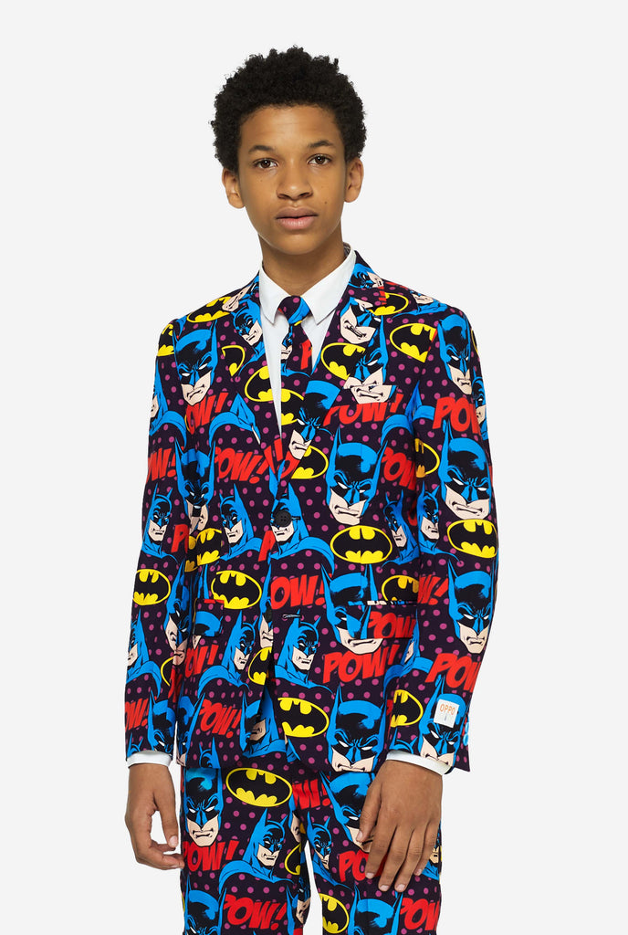 Teen wearing form suit with Batman print