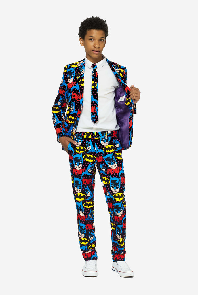 Teen wearing form suit with Batman print