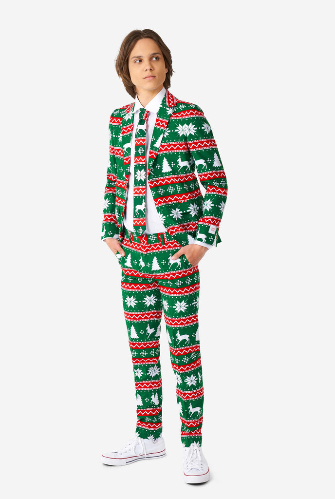 Teen wearing green formal Christmas suit