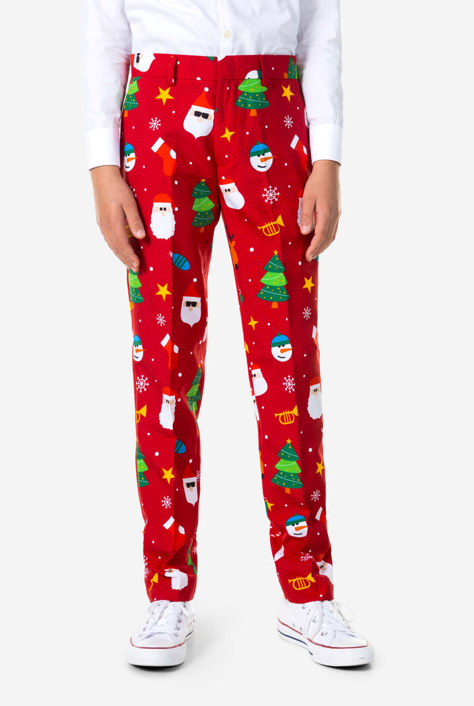 Teen wearing formal red Christmas suit, zoomed in at pants